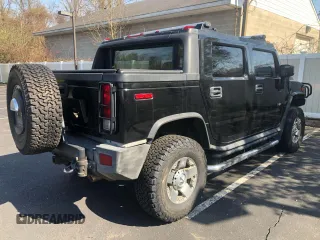 2006 Hummer H2 with VIN 5GRGN22U56H102463, listed as a Copart auction lot 54819425 with 100,096 mi miles and Clean Title. Bid and sale history available at carsss.com. Image 3.