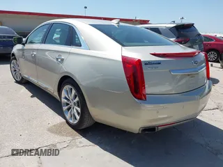 2016 Cadillac XTS Luxury Collection with VIN 2G61M5S31G9146455, listed as a IAAI auction lot 42019234 with 72,019 mi miles. Bid and sale history available at carsss.com. Image 3.