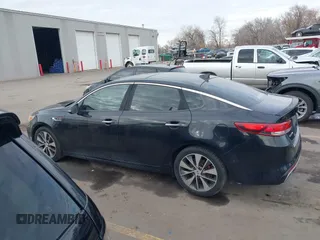 2016 Kia Optima SX Turbo with VIN 5XXGW4L2XGG052746, listed as a IAAI auction lot 41306792 with 69,571 mi miles and . Bid and sale history available at carsss.com. Image 14.