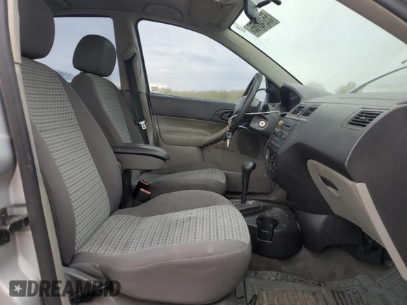 2007 Ford Focus S z VIN 1FAFP34N97W236303, wystawiony jako Copart lot #55248765 z przebiegiem 125 900 mil mil oraz Szkoda całkowita • Salvage title. Historia ofert i sprzedaży dostępna na DreamBid. Obrazek 7.