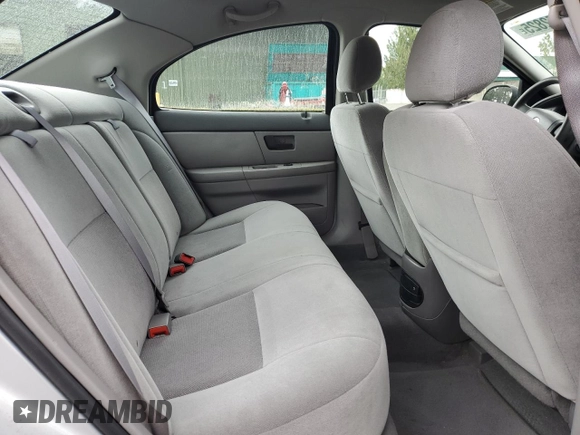 2004 Mercury Sable GS z VIN 1MEFM50U34G601378, wystawiony jako Copart lot #56952825 z przebiegiem 63 456 mil mil oraz Tytuł czysty. Historia ofert i sprzedaży dostępna na DreamBid. Obrazek 10.