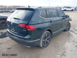 2019 Volkswagen Tiguan SE with VIN 3VV2B7AX1KM154435, listed as a IAAI auction lot 41740969 with 103,310 mi miles. Bid and sale history available at carsss.com. Image 4.