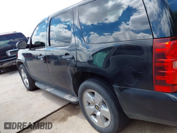 2013 Chevrolet Tahoe Commercial with VIN 1GNLC2E09DR286027, listed as a IAAI auction lot 42229760 with 203,474 mi miles and . Bid and sale history available at DreamBid. Image 14.