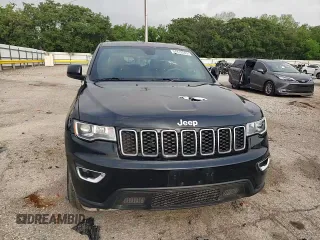 2018 Jeep Grand Cherokee Laredo E with VIN 1C4RJEAG2JC353823, listed as a Copart auction lot 54419545 with 116,770 mi miles and Salvage title. Bid and sale history available at DreamBid. Image 14.