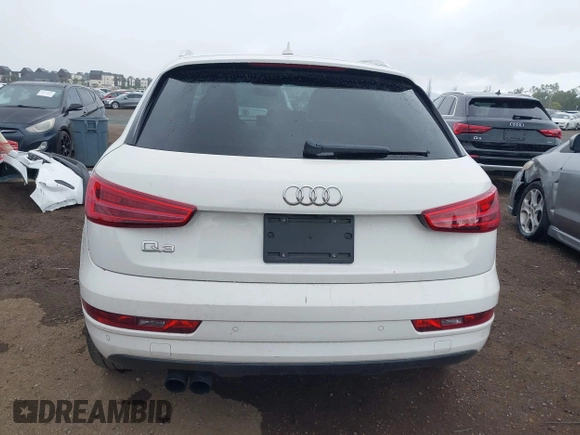 2016 Audi Q3 Premium Plus with VIN WA1BFCFS0GR009654, listed as a IAAI auction lot 42141372 with 138,992 mi miles. Bid and sale history available at carsss.com. Image 16.