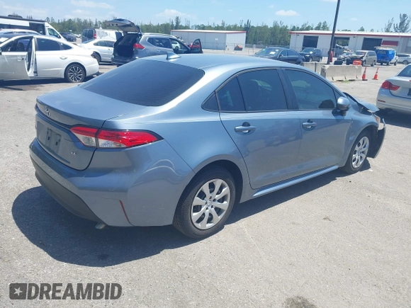 2023 Toyota Corolla LE with VIN 5YFB4MDE9PP016692, listed as a IAAI auction lot 42136141 with 34,671 mi miles and . Bid and sale history available at carsss.com. Image 4.