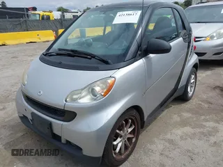 2008 Smart fortwo Pure z VIN WMEEJ31X18K191722, wystawiony jako IAAI lot #42138617 z przebiegiem 117 263 mil mil oraz . Historia ofert i sprzedaży dostępna na DreamBid. Obrazek 2.