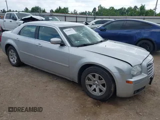 2006 Chrysler 300 Touring with VIN 2C3KA53GX6H113815, listed as a IAAI auction lot 42149912 with 144,813 mi miles. Bid and sale history available at carsss.com. Image 1.