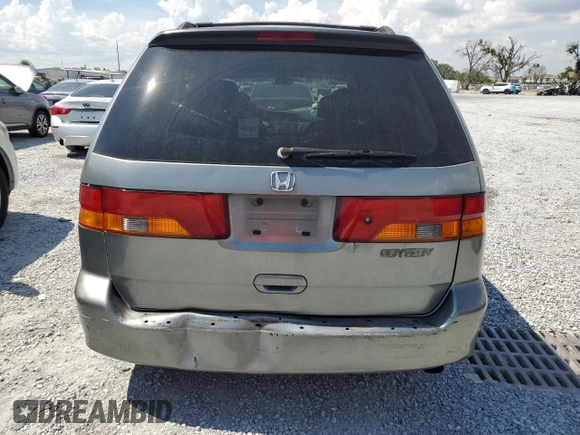 2002 Honda Odyssey EX-L with VIN 2HKRL18962H552809, listed as a Copart auction lot 63631115 with 224,019 mi miles and Salvage title. Bid and sale history available at DreamBid. Image 6.