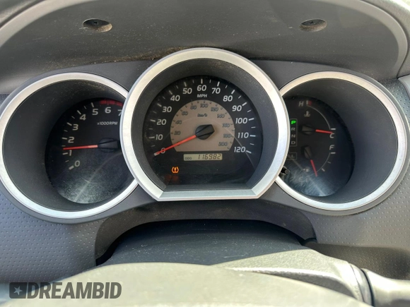 2009 Toyota Tacoma z VIN 5TEUU42N79Z618399, wystawiony jako Copart lot #56635095 z przebiegiem 116 982 mil mil oraz Czysty tytuł • Clean title. Historia ofert i sprzedaży dostępna na DreamBid. Obrazek 8.