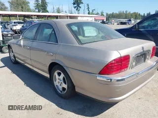 2000 Lincoln LS z VIN 1LNHM86S9YY852483, wystawiony jako IAAI lot #42292141 z przebiegiem 126 347 mil mil oraz . Historia ofert i sprzedaży dostępna na DreamBid. Obrazek 3.