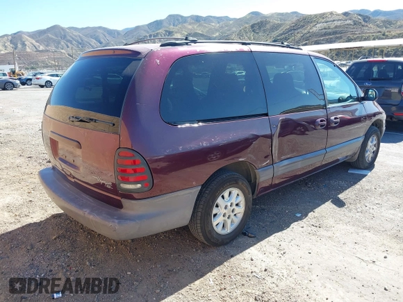 2000 Plymouth Voyager Grand SE z VIN 1P4GP44G8YB513887, wystawiony jako IAAI lot #41515488 z przebiegiem 330 867 mil mil oraz . Historia ofert i sprzedaży dostępna na DreamBid. Obrazek 4.