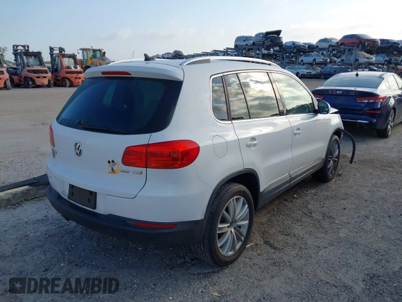 2013 Volkswagen Tiguan SE with VIN WVGAV7AX5DW545202, listed as a IAAI auction lot 42318584 with 91,556 mi miles and . Bid and sale history available at DreamBid. Image 4.