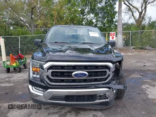 2021 Ford F-150 XL z VIN 1FTEW1CP7MKD20266, wystawiony jako IAAI lot #41618910 z przebiegiem 80 194 mil mil oraz . Historia ofert i sprzedaży dostępna na DreamBid. Obrazek 12.