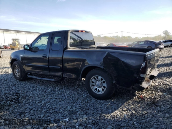 2002 Ford F-150 XL with VIN 1FTRX17L42NB06983, listed as a Copart auction lot 54172855 with 150,243 mi miles and Salvage title. Bid and sale history available at DreamBid. Image 2.