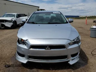 2014 Mitsubishi Lancer SE z VIN JA32V2FW3EU602908, wystawiony jako Copart lot #60148705 z przebiegiem 188 938 mil mil oraz Szkoda całkowita • Salvage title. Historia ofert i sprzedaży dostępna na DreamBid. Obrazek 5.