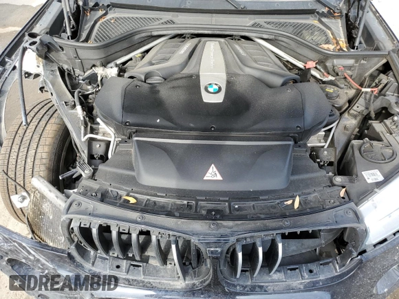 2015 BMW X6 xDrive50i with VIN 5UXKU6C56F0F93641, listed as a Copart auction lot 77233553 with 71,409 mi miles. Bid and sale history available at carsss.com. Image 12.