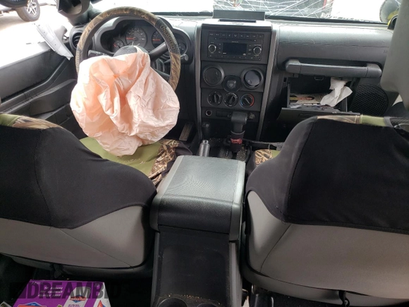 2007 Jeep Wrangler Unlimited X with VIN 1J4GA39147L207549, listed as a Copart auction lot 47291165 with 141,325 mi miles and Salvage title. Bid and sale history available at DreamBid. Image 8.