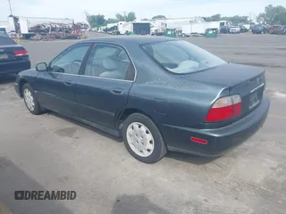 1997 Honda Accord LX z VIN 1HGCD5636VA178059, wystawiony jako IAAI lot #42228506 z przebiegiem 264 174 mil mil oraz . Historia ofert i sprzedaży dostępna na DreamBid. Obrazek 3.