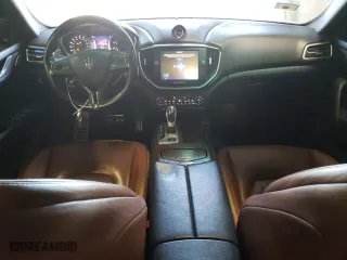 2014 Maserati Ghibli S Q4 with VIN ZAM57RTA4E1117703, listed as a Copart auction lot 48754515 with 104,284 mi miles and Salvage Title. Bid and sale history available at carsss.com. Image 8.