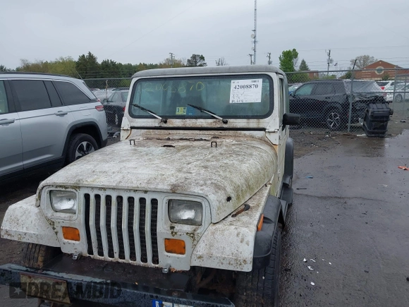1990 Jeep Wrangler with VIN 2J4FY29T6LJ523487, listed as a IAAI auction lot 42008870 with 88,619 mi miles and . Bid and sale history available at DreamBid. Image 6.