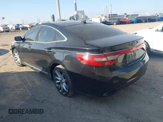 2013 Hyundai Azera with VIN KMHFH4JG9DA198966, listed as a IAAI auction lot 42232410 with 177,041 mi miles and . Bid and sale history available at carsss.com. Image 3.