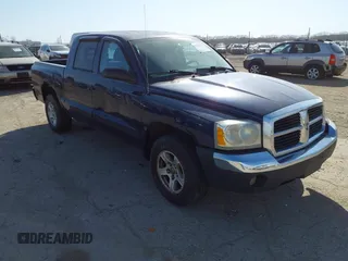 2005 Dodge Dakota SLT with VIN 1D7HE48N55S163580, listed as a IAAI auction lot 41776155 with 164,671 mi miles. Bid and sale history available at carsss.com. Image 1.