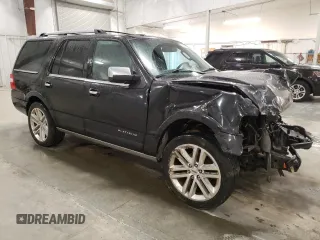 2015 Ford Expedition Platinum with VIN 1FMJU1MT5FEF18003, listed as a Copart auction lot 50179905 with 127,758 mi miles and Salvage title. Bid and sale history available at DreamBid. Image 4.