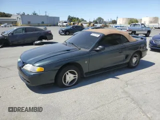 1998 Ford Mustang with VIN 1FAFP4447WF156297, listed as a Copart auction lot 60757265 with 61,296 mi miles and Salvage title. Bid and sale history available at DreamBid. Image 1.