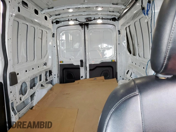 2020 Ford Transit Cargo with VIN 1FTBR1CG2LKB71838, listed as a Copart auction lot 59989875 with 326,938 mi miles and Salvage title. Bid and sale history available at DreamBid. Image 10.