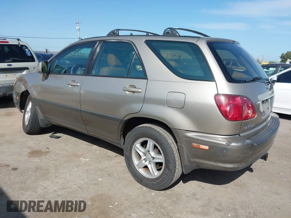1999 Lexus RX 300 with VIN JT6HF10U6X0092078, listed as a IAAI auction lot 41988259 with 144,148 mi miles and . Bid and sale history available at DreamBid. Image 3.