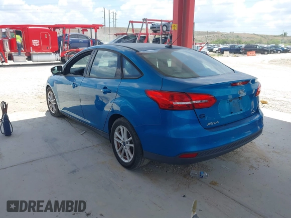 2015 Ford Focus SE with VIN 1FADP3F2XFL354354, listed as a IAAI auction lot 42183319 with 102,232 mi miles and . Bid and sale history available at carsss.com. Image 3.