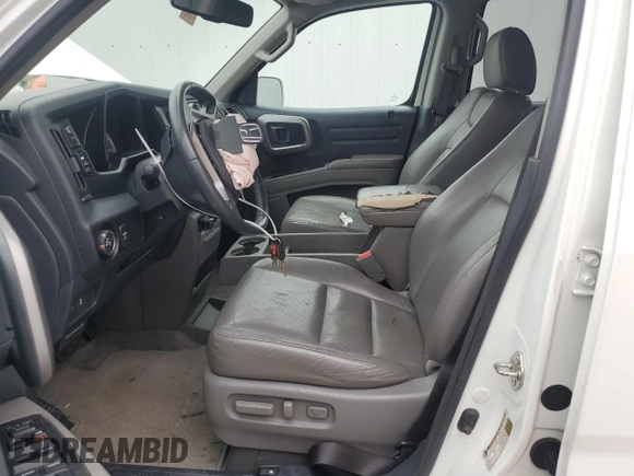 2014 Honda Ridgeline RTL with VIN 5FPYK1F57EB009851, listed as a Copart auction lot 62319504 with 55,718 mi miles and Clean Title. Bid and sale history available at carsss.com. Image 7.