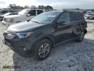 2016 Toyota RAV4 Hybrid XLE with VIN JTMRJREV2GD059101, listed as a Copart auction lot 69439222 with 74,915 mi miles. Bid and sale history available at carsss.com. Image 1.