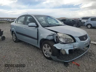 2009 Kia Rio LX with VIN KNADE223496469797, listed as a Copart auction lot 71005774 with 130,675 mi miles and Salvage Title. Bid and sale history available at carsss.com. Image 4.