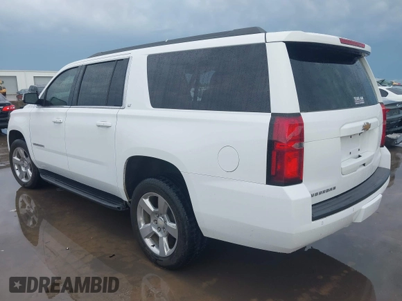 2018 Chevrolet Suburban LT with VIN 1GNSCHKC2JR376239, listed as a IAAI auction lot 42110551 with 123,694 mi miles and . Bid and sale history available at DreamBid. Image 3.