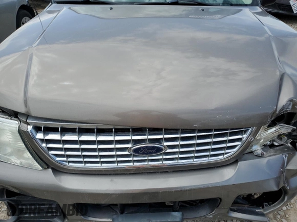 2004 Ford Explorer XLT z VIN 1FMZU73K94UA75050, wystawiony jako Copart lot #55807805 z przebiegiem 133 475 mil mil oraz Szkoda całkowita • Salvage title. Historia ofert i sprzedaży dostępna na DreamBid. Obrazek 11.