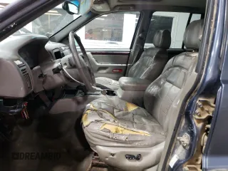 2001 Jeep Grand Cherokee Limited with VIN 1J4GW58N01C664996, listed as a Copart auction lot 58339825 with 288,153 mi miles and Salvage title. Bid and sale history available at DreamBid. Image 7.