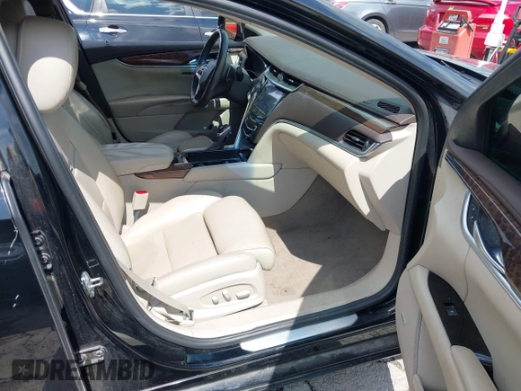 2013 Cadillac XTS Premium with VIN 2G61S5S39D9144177, listed as a IAAI auction lot 42111910 with 69,830 mi miles. Bid and sale history available at carsss.com. Image 5.
