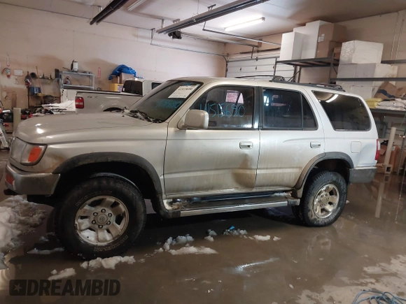 1998 Toyota 4Runner SR5 with VIN JT3HN86R1W0183463, listed as a IAAI auction lot 41515690 with 299,355 mi miles and . Bid and sale history available at DreamBid. Image 14.