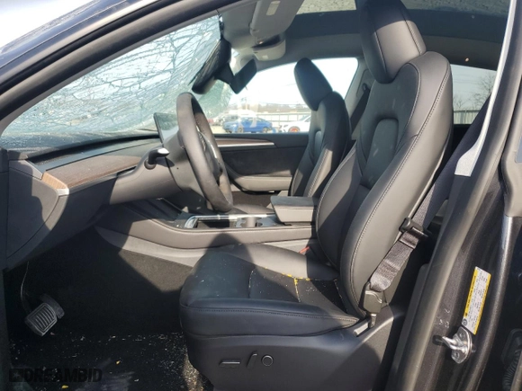 2025 Tesla Model Y Long Range with VIN 7SAYGDEE9SF224174, listed as a Copart auction lot 48988195 with 5,696 mi miles and Salvage Title. Bid and sale history available at carsss.com. Image 7.