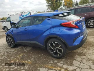 2021 Toyota C-HR LE with VIN JTNKHMBX2M1107890, listed as a Copart auction lot 77992554 with 54,219 mi miles and Salvage Title. Bid and sale history available at carsss.com. Image 2.