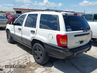 2004 Jeep Grand Cherokee Laredo z VIN 1J4GX48S74C152542, wystawiony jako IAAI lot #42350507 z przebiegiem 176 366 mil mil oraz . Historia ofert i sprzedaży dostępna na DreamBid. Obrazek 3.