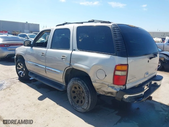 2005 GMC Yukon SLT with VIN 1GKEC13T15R144480, listed as a IAAI auction lot 41632540 with 184,038 mi miles. Bid and sale history available at carsss.com. Image 3.