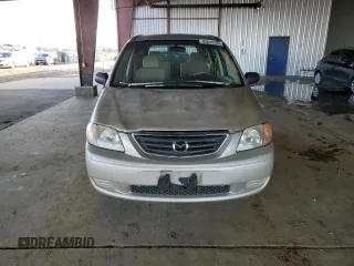 2000 Mazda MPV DX with VIN JM3LW28G8Y0142883, listed as a Copart auction lot 82633154 with 161,196 mi miles and Salvage title. Bid and sale history available at DreamBid. Image 5.