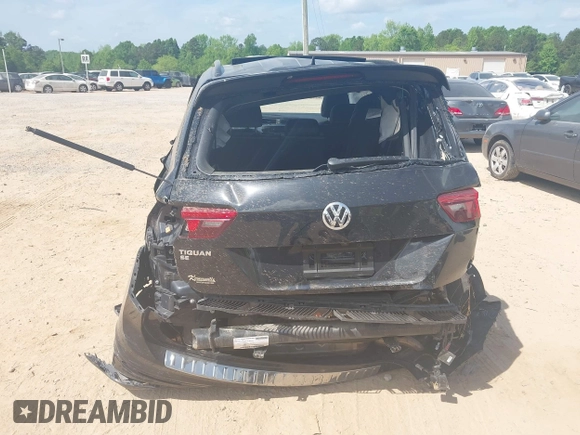 2021 Volkswagen Tiguan SE z VIN 3VV3B7AX5MM027369, wystawiony jako IAAI lot #42082821 z przebiegiem 74 024 mil mil oraz . Historia ofert i sprzedaży dostępna na DreamBid. Obrazek 16.