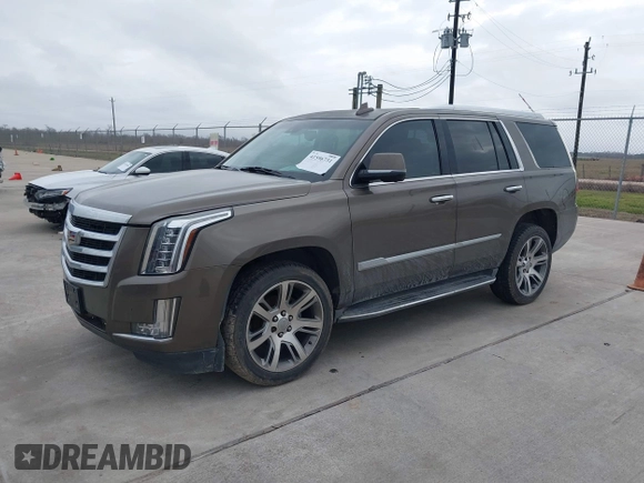 2015 Cadillac Escalade Luxury z VIN 1GYS3MKJ9FR725818, wystawiony jako IAAI lot #41596731 z przebiegiem 224 246 mil mil oraz . Historia ofert i sprzedaży dostępna na DreamBid. Obrazek 17.