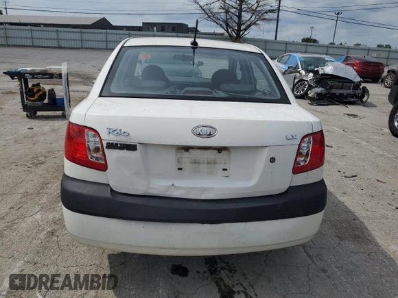 2009 Kia Rio LX with VIN KNADE223996526222, listed as a Copart auction lot 69976484 with 318,702 mi miles and Salvage Title. Bid and sale history available at DreamBid. Image 6.