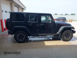 2015 Jeep Wrangler Unlimited Rubicon Hard Rock с VIN 1C4HJWFG0FL550247, выставлен на аукционе IAAI как лот 42474614 с пробегом 93 084 миль миль и . История ставок и продаж доступна на DreamBid. Изображение 13.
