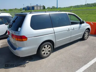 2003 Honda Odyssey EX-L with VIN 5FNRL18983B050769, listed as a IAAI auction lot 42113963 with 287,552 mi miles and . Bid and sale history available at DreamBid. Image 4.